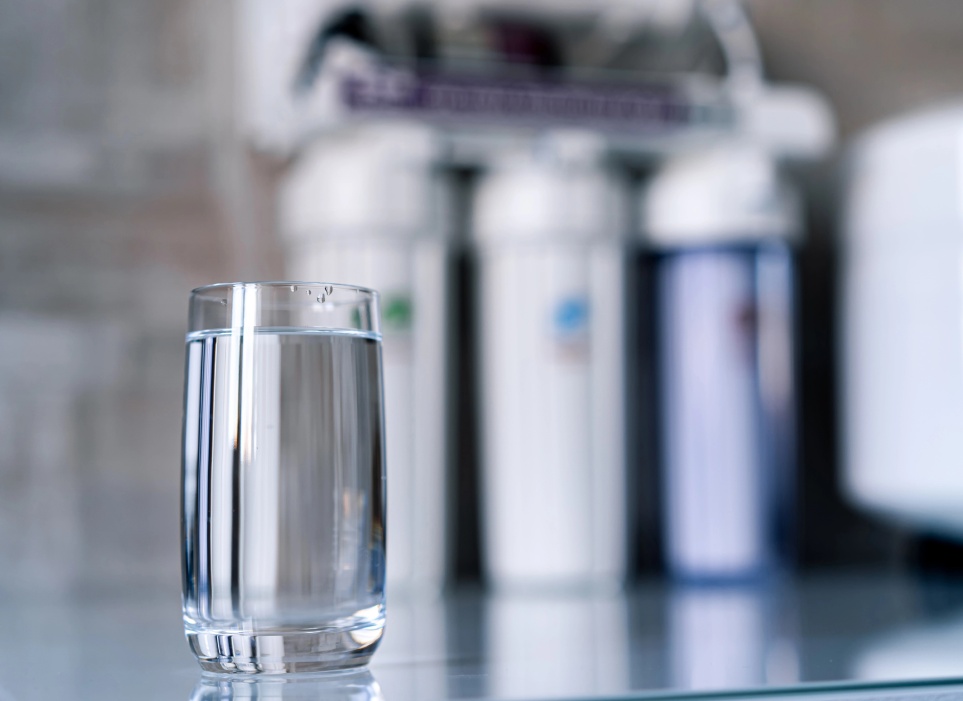 cleane water in glass infront of water purification system img 1 pool chemicals image